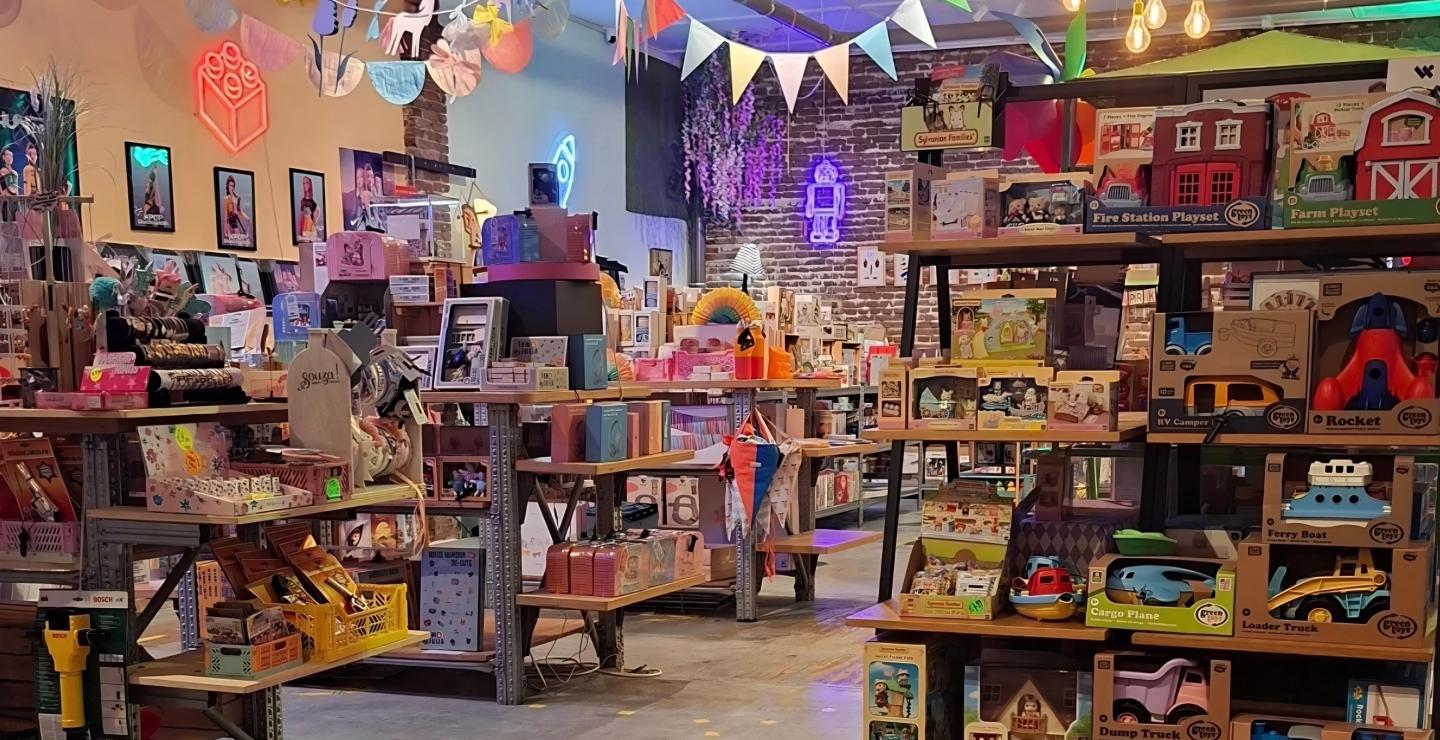 Toy products on the shelves at the toy store Meneer Paprika Haarlem
