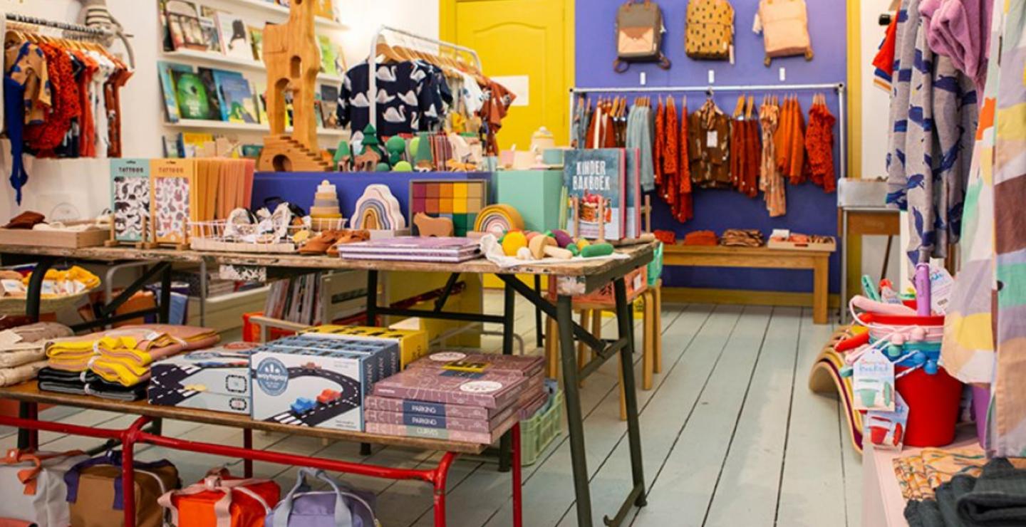 Interior of the Stokstaart shop with clothing and toys